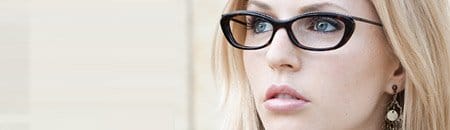 person looking serious designer eyewear frames